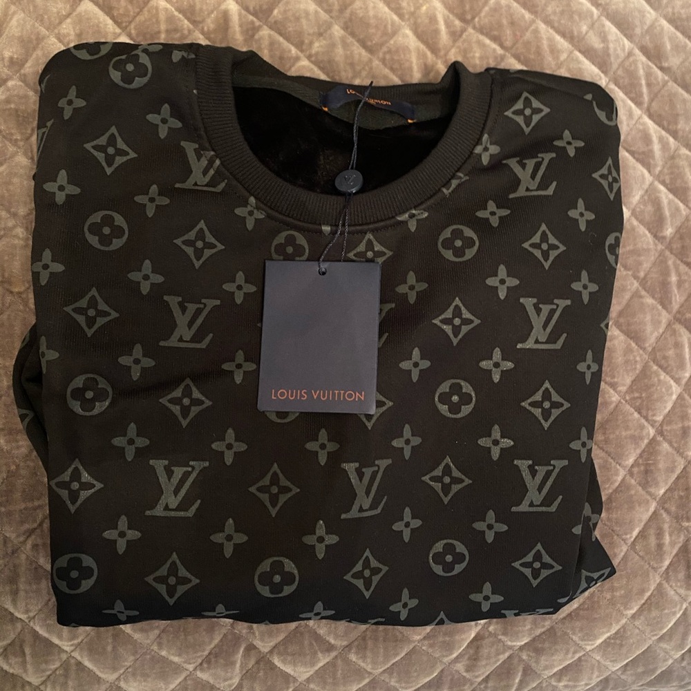 LV. Not authentic. Brand new. Love it but is too small. Very warm and cozy